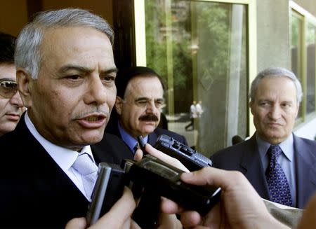 Yashwant Sinha talks to reporters at the Syrian foreign ministry in Damascus on August 2, 2003. REUTERS/Khaled al-Hariri/File Photo