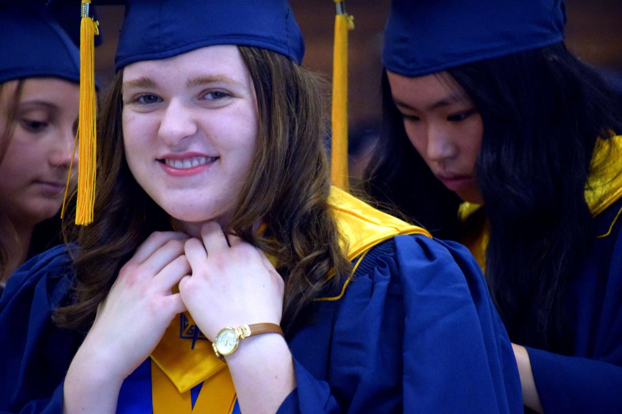 Mooresville High School Class of 2022 Valedictorian Isabel Shostrand gets ready for the graduation ceremony on Saturday, May 28.