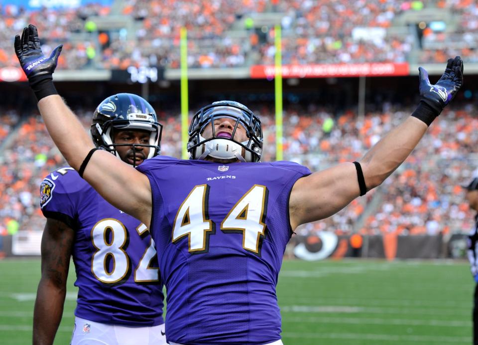 Baltimore Ravens fullback Kyle Juszczyk celebrates his first NFL career touchdown, a 9-yard TD catch against the Browns on Sept. 21, 2014, in Cleveland.