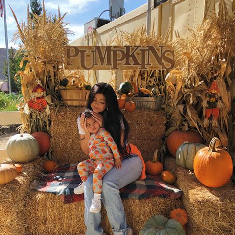 <p>Kylie and Travis took Stormi and cousin Dream to a pumpkin patch and of course the reality star also dressed her daughter in an outfit covered in pumpkins.</p><p><a href="https://www.instagram.com/p/B3sHagnntf2/" rel="nofollow noopener" target="_blank" data-ylk="slk:See the original post on Instagram;elm:context_link;itc:0;sec:content-canvas" class="link ">See the original post on Instagram</a></p>