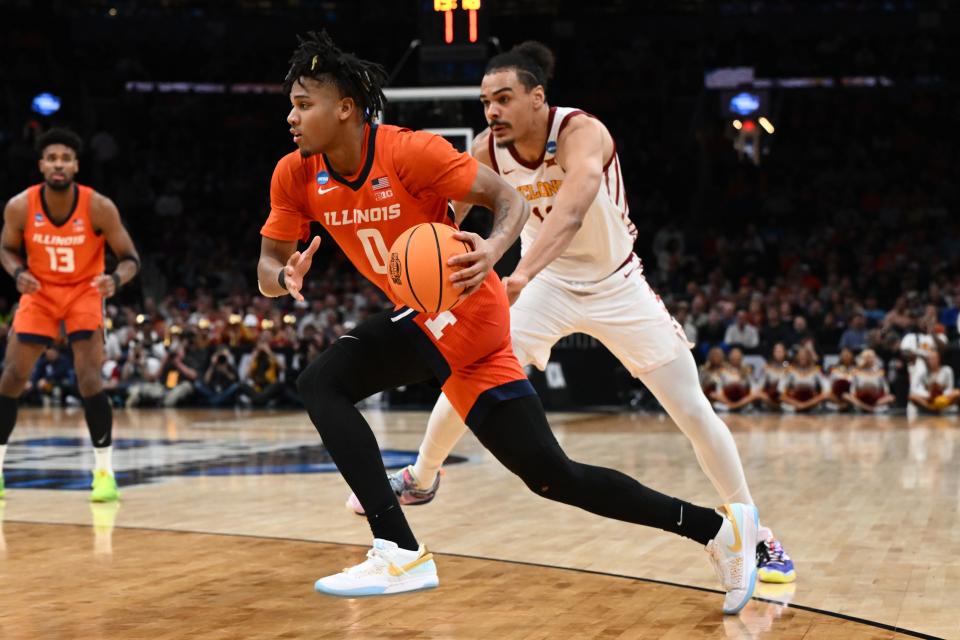 Illinois guard Terrence Shannon Jr. (0) dribbles the ball against Iowa State during the semifinals of the East Regional of the 2024 NCAA men's tournament at TD Garden.