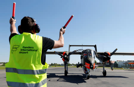 An OV-10 Bronco aircraft prepares to take off at Flanders international airport, ahead of the world's first Short Take Off & Landing competition on sand, in Wevelgem, Belgium May 8, 2018. REUTERS/Francois Lenoir