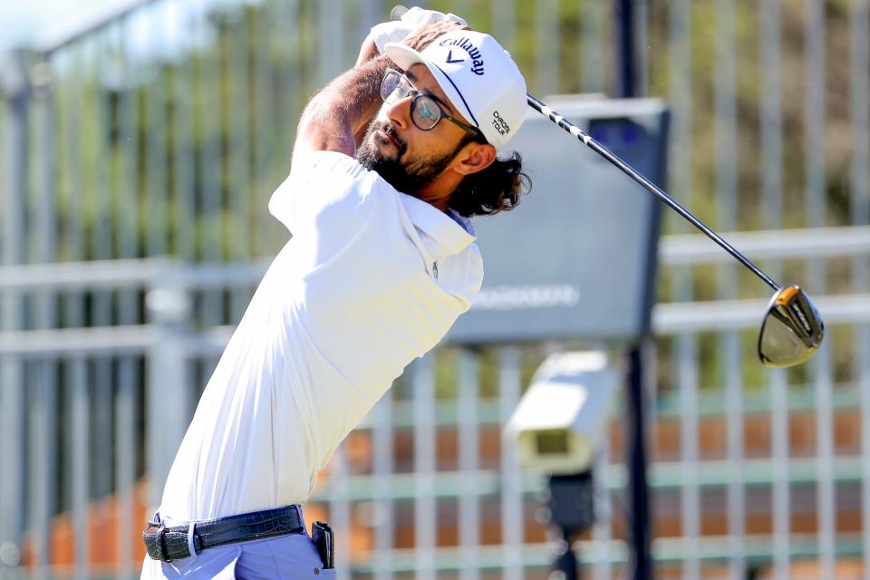 Akshay Bhatia tees off from the 10th hole during the first round of the Valero Texas Open golf tournament.