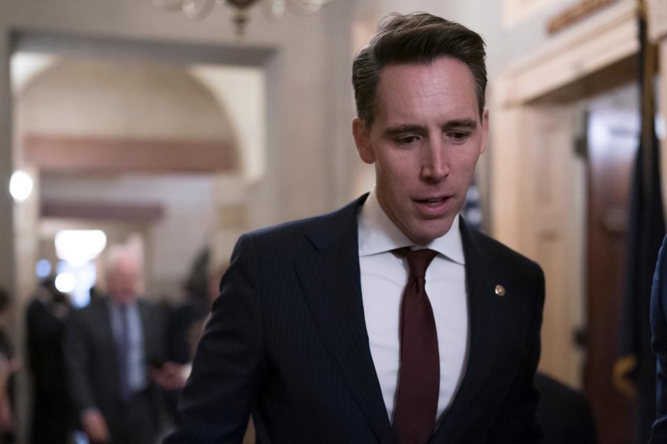 Sen. Josh Hawley, R-Mo., walks at the Capitol in Washington, Nov. 16, 2022.