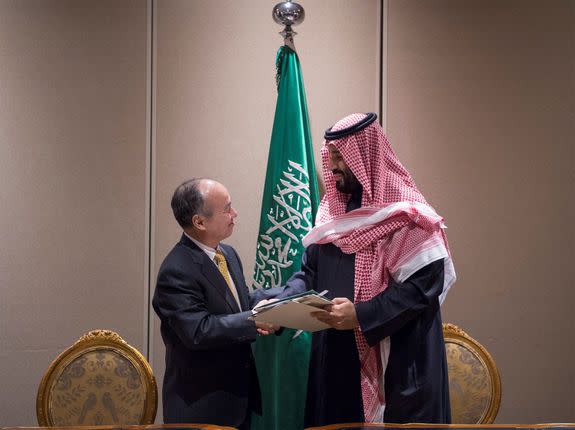 Crown Prince of Saudi Arabia Mohammed bin Salman Al Saud and Masayoshi Son sign a memorandum of understanding in New York on March 28.