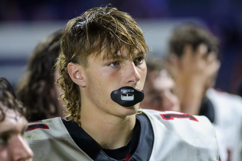 Cayden Davis listens postgame following the IHSAA football game against the Frankfort Hot Dogs, Friday, Aug. 25, 2023, at Frankfort High School in Frankfort, Ind. Clinton Prairie won 39-8.