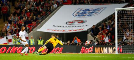 Football - England v Estonia - UEFA Euro 2016 Qualifying Group E - Wembley Stadium, London, England - 9/10/15 England's Theo Walcott scores their first goal Reuters / Darren Staples