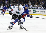 New York Rangers' Patrik Nemeth (12) defends against San Jose Sharks' Noah Gregor (73) during the first period of an NHL hockey game Friday, Dec. 3, 2021, in New York. (AP Photo/John Munson)