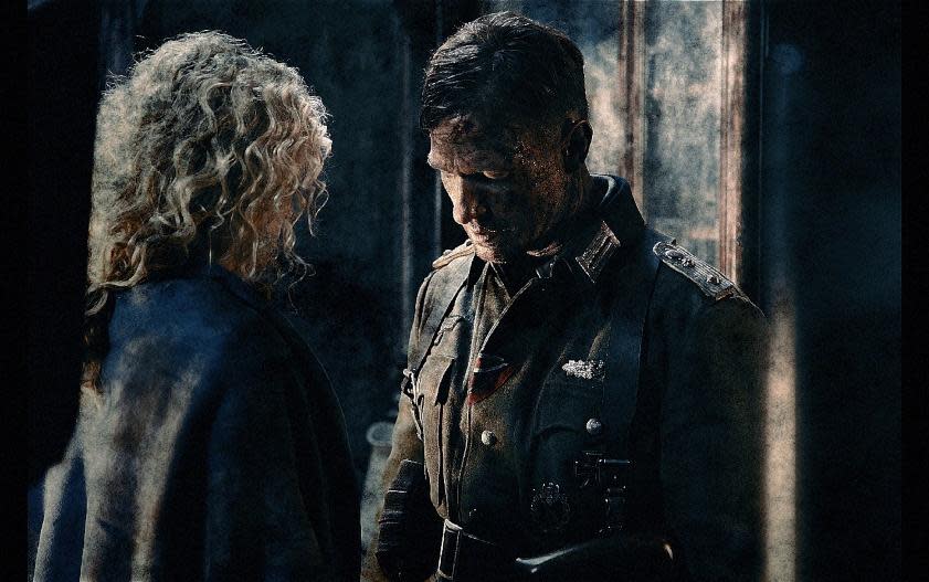 This image released by Sony Pictures shows Yanina Studilina, left, and Thomas Kretschmann in a scene from "Stalingrad." (AP Photo/Sony Pictures)