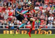 Britain Soccer Football - Sunderland v Middlesbrough - Premier League - Stadium of Light - 21/8/16 Sunderland's Duncan Watmore in action with Middlesbrough's Emilio Nsue Action Images via Reuters / Lee Smith Livepic EDITORIAL USE ONLY.