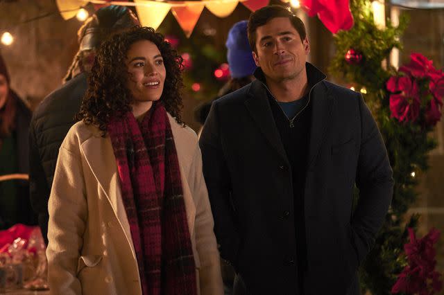 <p>Danielle Blancher/A+E Networks/Lifetime</p> Kathryn Davis and Olivier Renaud in Lifetime's 'Planes, Trains and Christmas Trees'