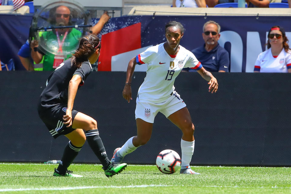 Crystal Dunn typically plays as an attacker for her club, but her versatility and the American team's depth upfront mean she starts as a defender for the USWNT. (Photo: Getty Editorial)