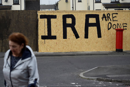 FILE PHOTO: IRA graffiti painted over with a message declaring it a defeated army in the aftermath of the killing of 29-year-old journalist Lyra McKee is pictured in Londonderry, Northern Ireland April 20, 2019. REUTERS/Clodagh Kilcoyne/File Photo