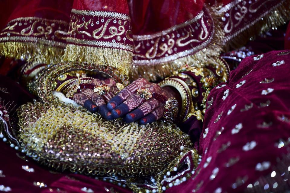 Representative: Indian bride in mass marriage in Ahmedabad on 23 October 2022 (AFP via Getty Images)