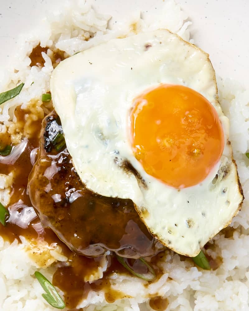 overhead shot of loco moco on a white plate, served over rice.