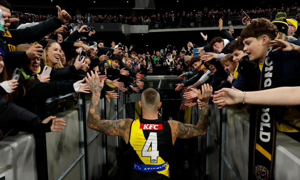 <span>Michael Willson’s photo of Martin exiting the MCG perfectly captures the man, the moment and the mood.</span><span>Photograph: Getty Images</span>