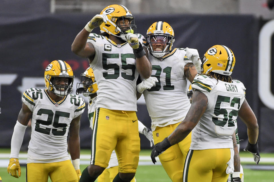 Green Bay Packers' Za'Darius Smith (55) and Preston Smith (91) 