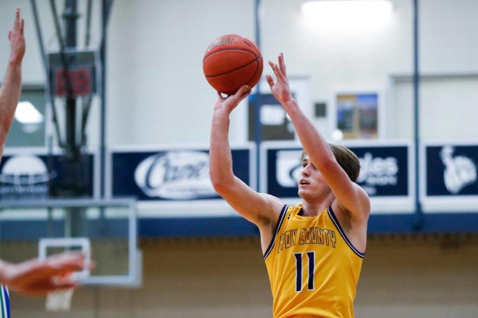 Lyon County star Travis Perry (11) is third in the state in scoring (29.4 ppg) and leads Kentucky high school basketball in made 3-pointers per game with an average of 4.6. The Kentucky Wildcats signee is leading a resurgence of in-state players ticketed to play college hoops at the highest levels.