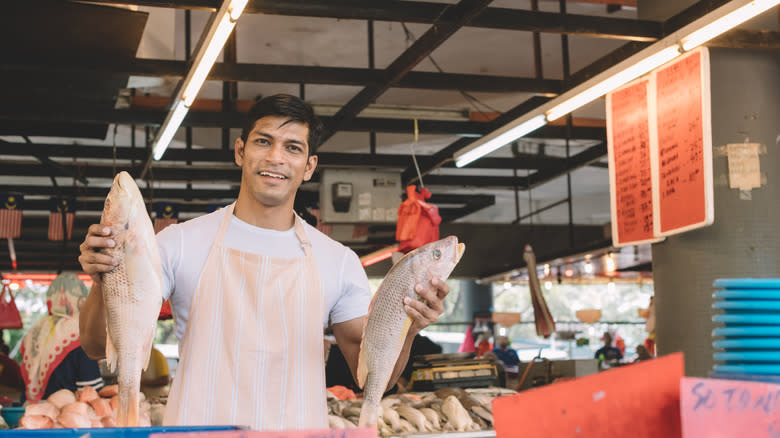 fishmonger at market