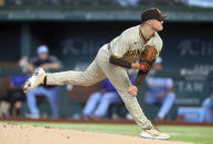 San Diego Padres starting pitcher Adrian Morejon delivers a pitch against the Texas Rangers in the first inning during a baseball game on Sunday, April 11, 2021, in Arlington, Texas. (AP Photo/Richard W. Rodriguez)