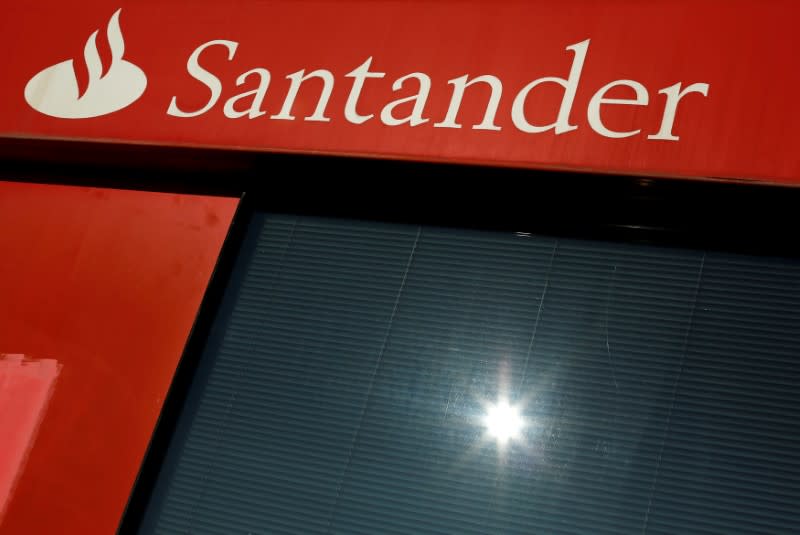 FILE PHOTO: A logo of Santander, the euro zone's largest lender by market value, is seen on a branch in the Andalusian capital of Seville