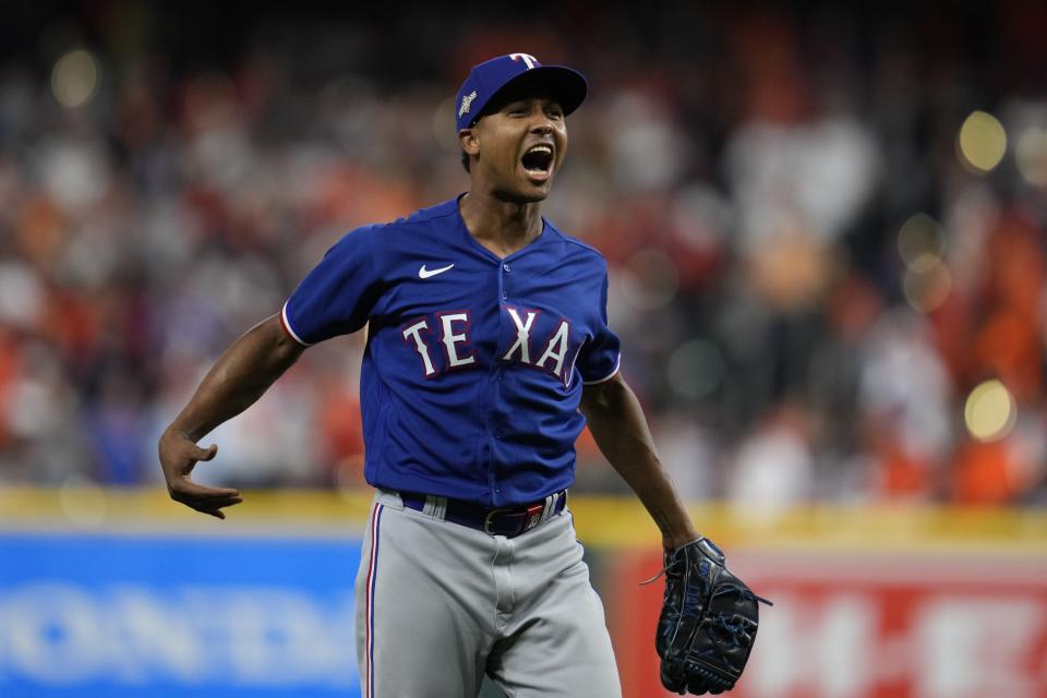 Texas Rangers' Jose Leclerc reacts after the final out of Game 1 of the baseball AL Championship Series against the Houston Astros Sunday, Oct. 15, 2023, in Houston. The Rangers won 2-0 to take a 1-0 lead in the series. (AP Photo/Godofredo A. Vasquez)