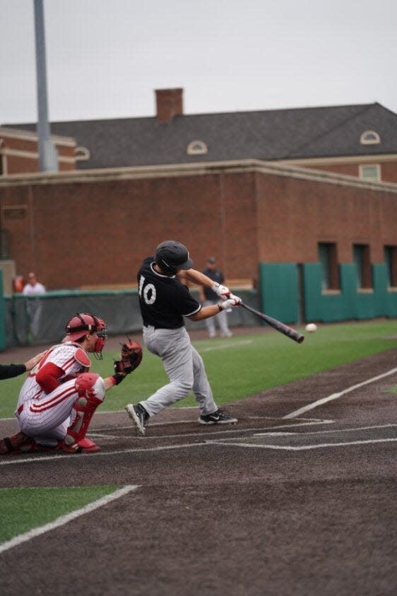 Cole Harting out of Mason High School cracks a hit for the UC Bearcats.