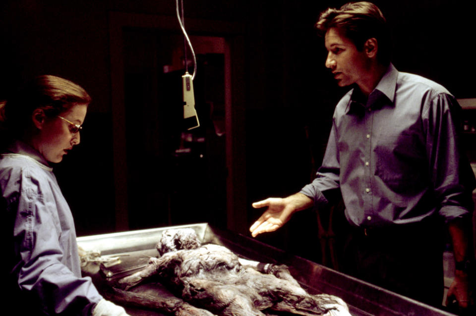 Scully and Mulder crack their first case in The X-Files series premiere. (20th Century Fox/Courtesy Everett Collection)