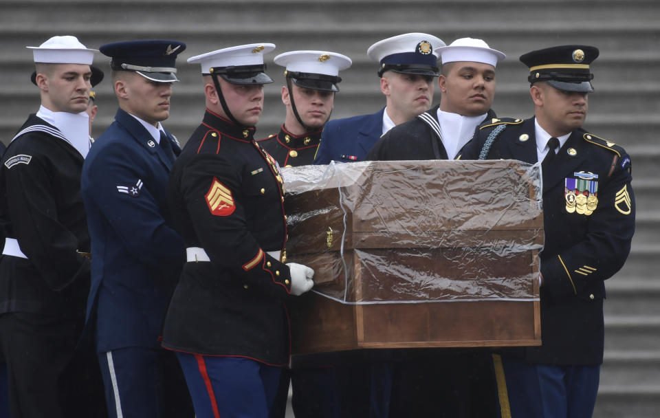 <p>The casket of Rev. Billy Graham is carried out of the U.S. Capitol in Washington, Thursday, March 1, 2018. (Photo: Susan Walsh/AP) </p>