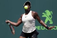 Mar 29, 2018; Key Biscayne, FL, USA; Sloane Stephens of the United States hits a forehand against Victoria Azarenka of Belarus (not pictured) in a women's singles semi-final of the Miami Open at Tennis Center at Crandon Park. Mandatory Credit: Geoff Burke-USA TODAY Sports