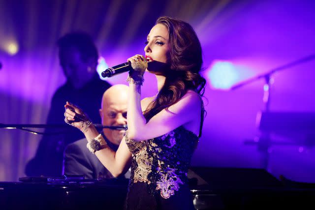 Myrna M. Suarez/Getty Alexa Ray Joel performs on stage with her dad Billy Joel.