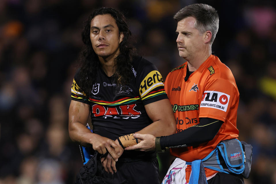 Jarome Luai, pictured here after dislocating his shoulder in Penrith's loss to Parramatta.