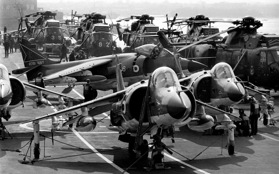 The Sea Harriers ranged on the flight deck of HMS Hermes, sailing south in 1982 - PA/Martin Cleaver