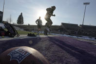 UW Whitewater lineman Quinn Meinerz jumps as he warms up at the school's pro football day Tuesday, March 9, 2021, in Whitewater, Wisc. The only FCS teams hosting pro days this year were Central Arkansas, North Dakota State and South Dakota State. Division III Wisconsin-Whitewater held one only because its Senior Bowl revelation, offensive lineman Quinn Meinerz, warranted another look after his team did not play in the fall. (AP Photo/Morry Gash)