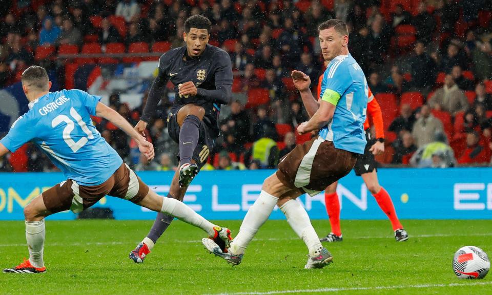 <span>Jude Bellingham scores England’s equaliser in stoppage time at Wembley against Belgium.</span><span>Photograph: Tom Jenkins/The Guardian</span>