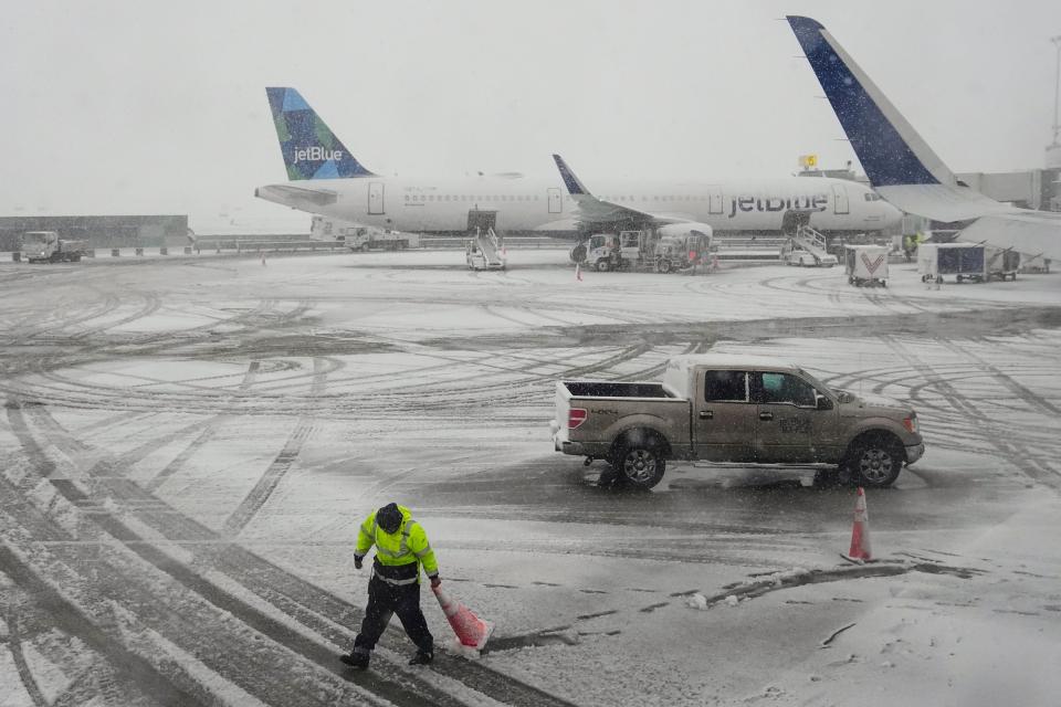 John F Kennedy International Airport, pictured above, has already cancelled 184 flights as of Tuesday morning (AP)
