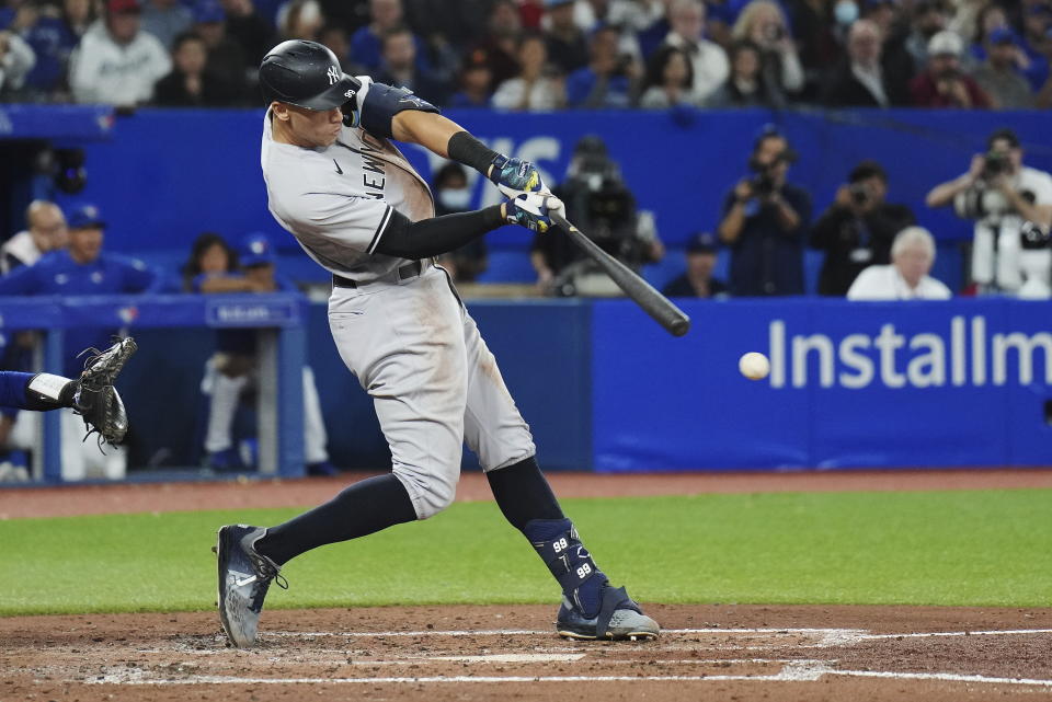 New York Yankees' Aaron Judge grounds out against the Toronto Blue Jays during the fourth inning of a baseball game Wednesday, Sept. 28, 2022, in Toronto. (Nathan Denette/The Canadian Press via AP)