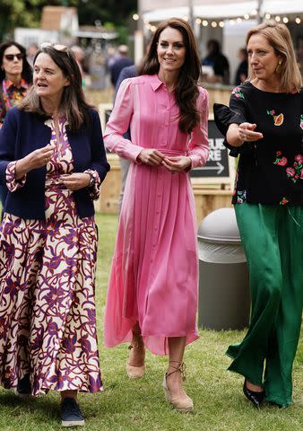 Kate Middleton Matches Pink Pumps With Pink Power Suit in London