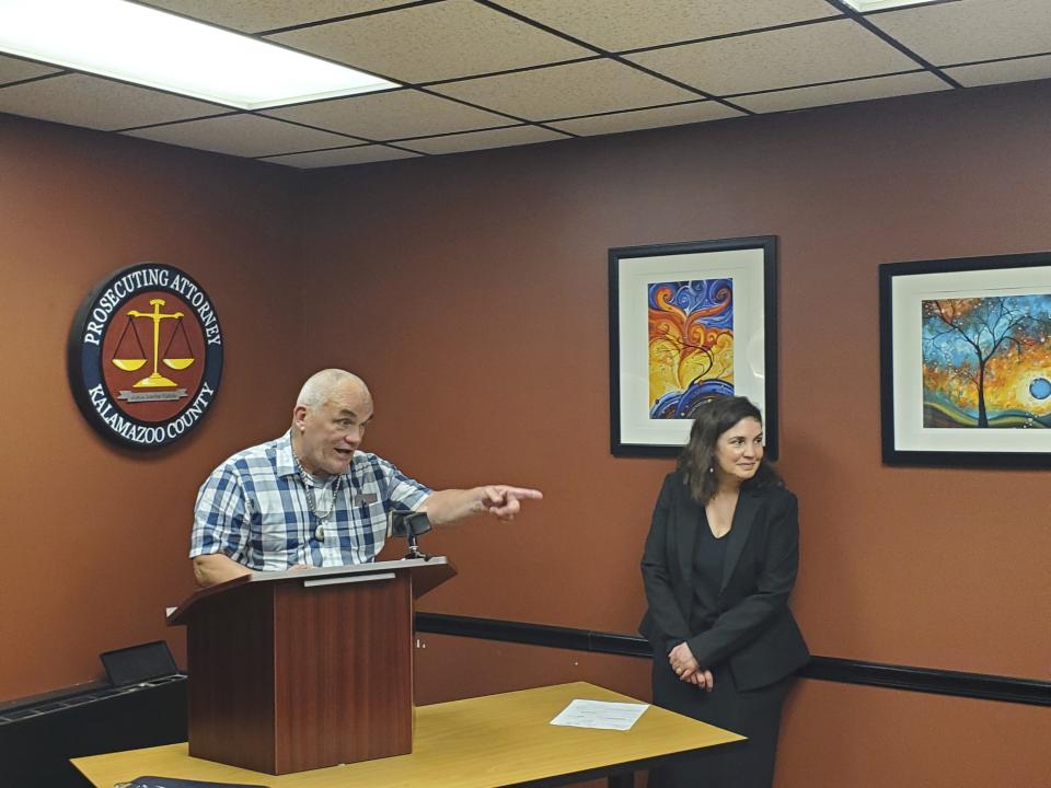 Jeff Titus speaks at a news conference after learning he will not face a second trial after his double murder conviction was overturned in Feb. 2023. His attorney, Mary Chartier, looks on. Kalamazoo County Prosecutor Jeff Getting said at a news conference on Thursday, June 1, 2023, that he decided to not proceed with a new trial. (Marie Weidmayer/Kalamazoo Gazette via AP)