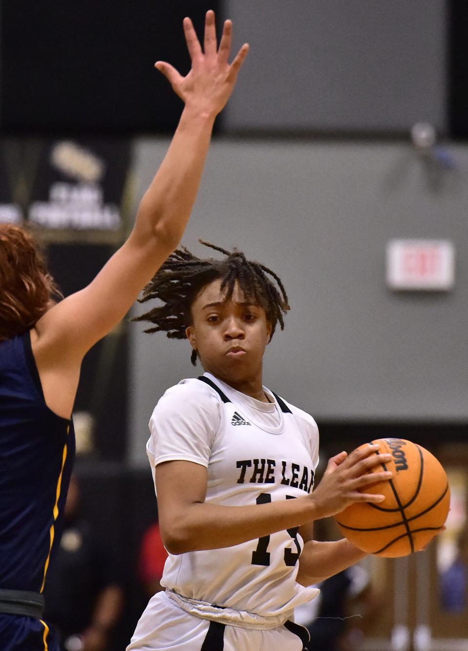 Oakleaf's Fantasia James (15) looks to get past a Land O'Lakes defender during the Class 6A playoffs.