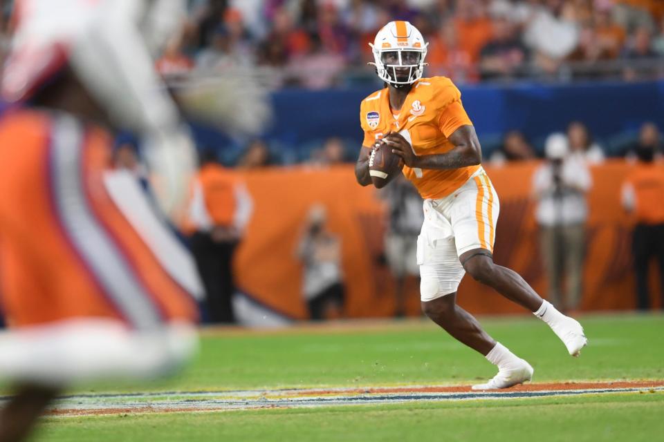 Tennessee quarterback Joe Milton III (7) looks to pass during the first half of the Orange Bowl game between the Tennessee Vols and Clemson Tigers at Hard Rock Stadium in Miami Gardens, Fla. on Friday, Dec. 30, 2022.