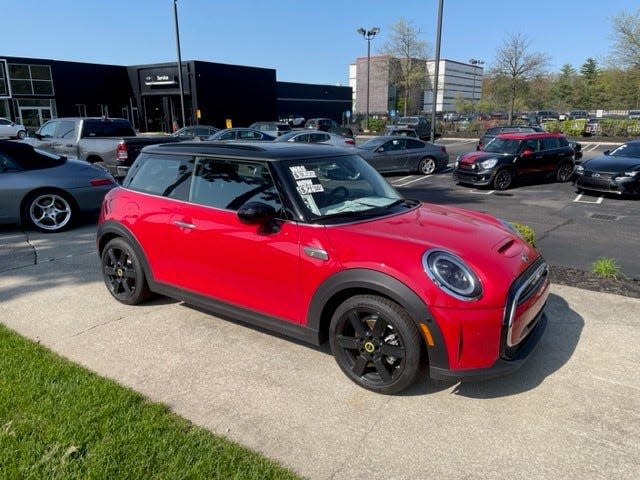 A 2022 Mini Signature Cooper SE all-electric used car at Motor City Mini in May 2023. Mini USA is trying to get more used EVs in its dealerships' fleets.