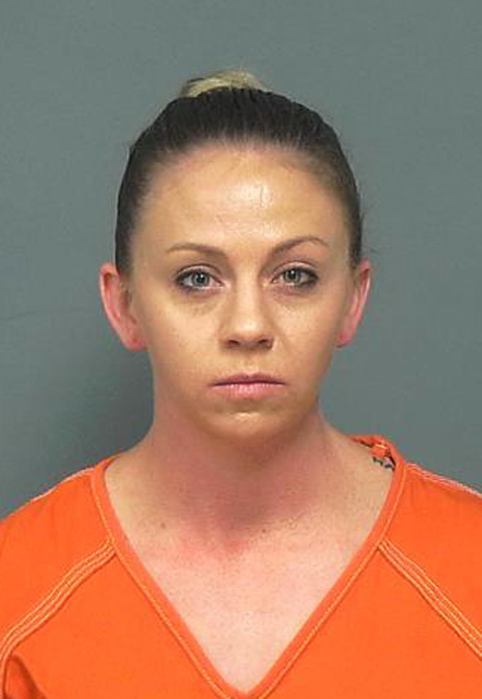 FILE - This Friday, Nov. 30, 2018, file photo provided by the Mesquite Police Department shows Amber Guyger. The former Dallas police officer Guyger was indicted on murder charges, nearly three months after she fatally shot an unarmed black neighbor whose apartment she said she entered by mistake, believing it to be her own. It's unclear when Guyger first talked to investigators about the Sept. 2018 shooting, but she was eventually charged and is serving 10 years in prison after being convicted of murder in Oct. 2019. (Mesquite Police Department via AP, File)