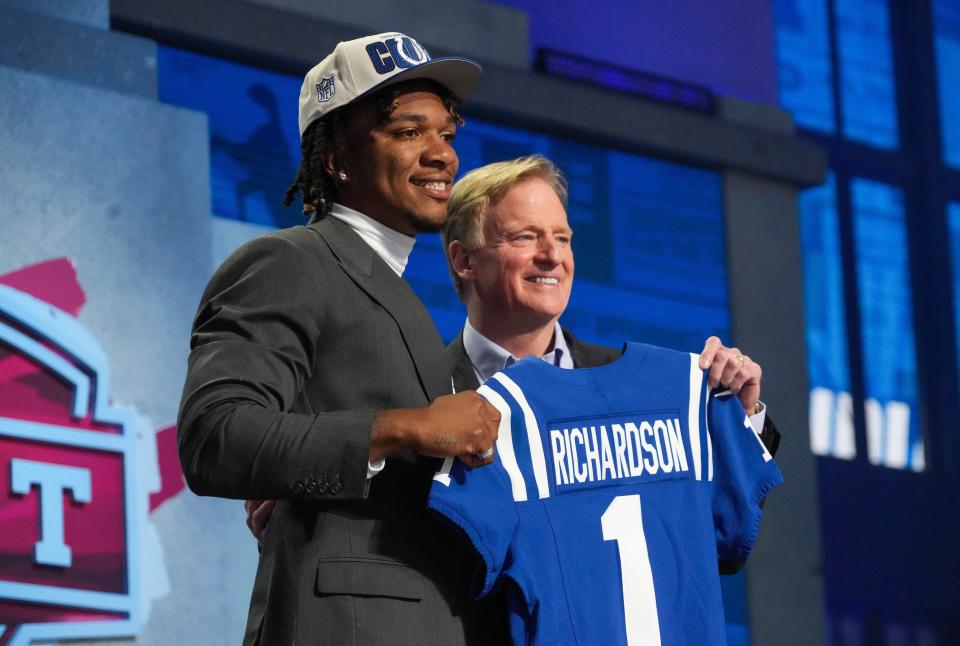 Anthony Richardson poses with NFL commissioner Roger Goodell after being selected by the Indianapolis Colts with the No. 4 overall pick.