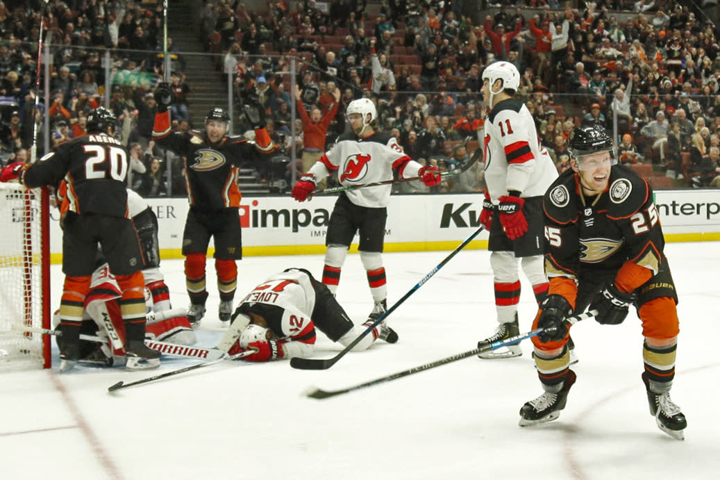 The New Jersey Devils scored three goals on themselves Sunday night, including a late game-tying one off of captain Ben Lovejoy (12). (Photo by Katharine Lotze/Getty Images)