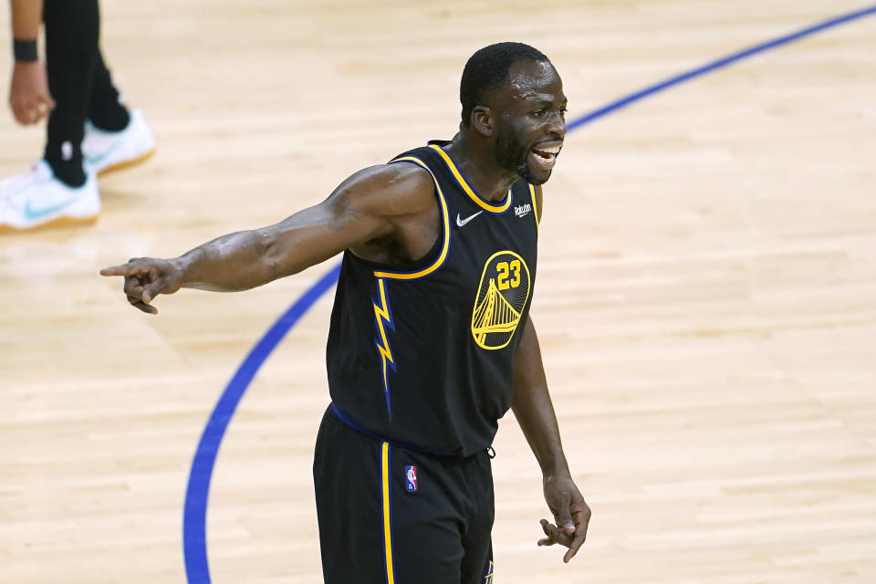 Golden State Warriors forward Draymond Green reacts toward officials after being called for a technical foul during the first half of the team's NBA basketball game against the Portland Trail Blazers in San Francisco, Wednesday, Dec. 8, 2021. (AP Photo/Jeff Chiu)