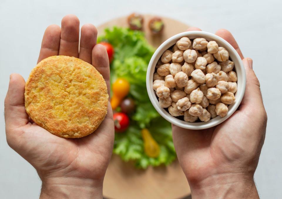 <span class="caption">Legumes are often used to create plant-based patties.</span> <span class="attribution"><a class="link " href="https://www.shutterstock.com/image-photo/mans-hands-holding-plant-based-non-1802315809" rel="nofollow noopener" target="_blank" data-ylk="slk:Shutterstock;elm:context_link;itc:0;sec:content-canvas">Shutterstock</a></span>