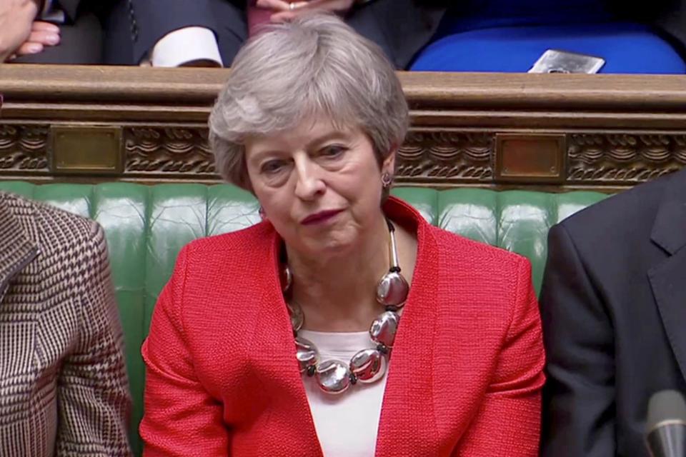 Theresa May looked forlorn after her Commons defeatREUTERS