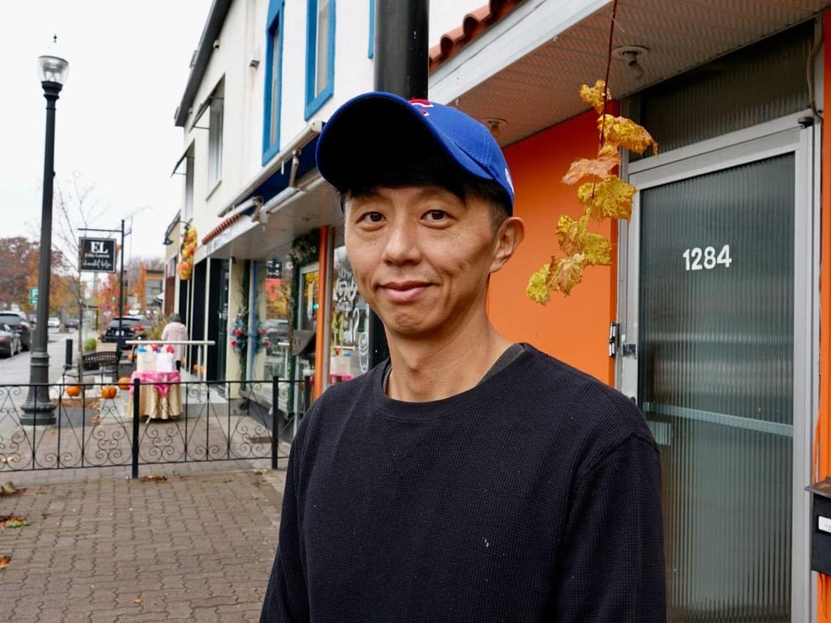 Joe closed his restaurant this month after he received threats because of the lack of French service. Wednesday marks the reopening after members of the Quebec City community helped Joe and his family translate the menu and hire French staff.   (Rachel Watts/CBC - image credit)