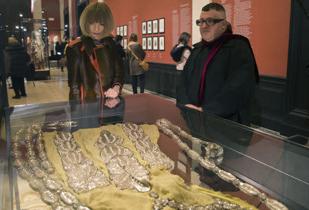 Alber Elbaz, Israeli-American artistic director for fashion house Lanvin (R), and U.S. Vogue Edtior-In-Chief Anna Wintour visit the Jeanne Lanvin exhibition at the Palais Galliera in Paris, March 6, 2015. REUTERS/Philippe Wojazer